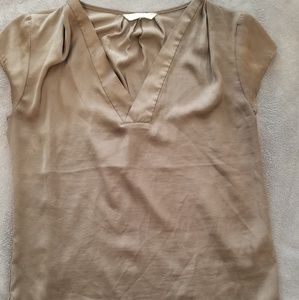 Gray short sleeve top.